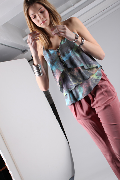 Model Caroline West heads for a wardrobe change. Model Caroline West heads for a wardrobe change.